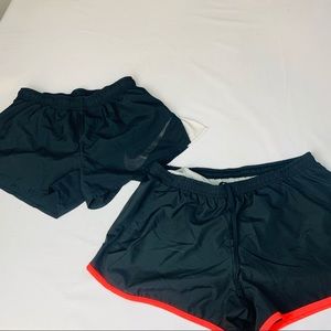 2 black Sz medium Nike running shorts.